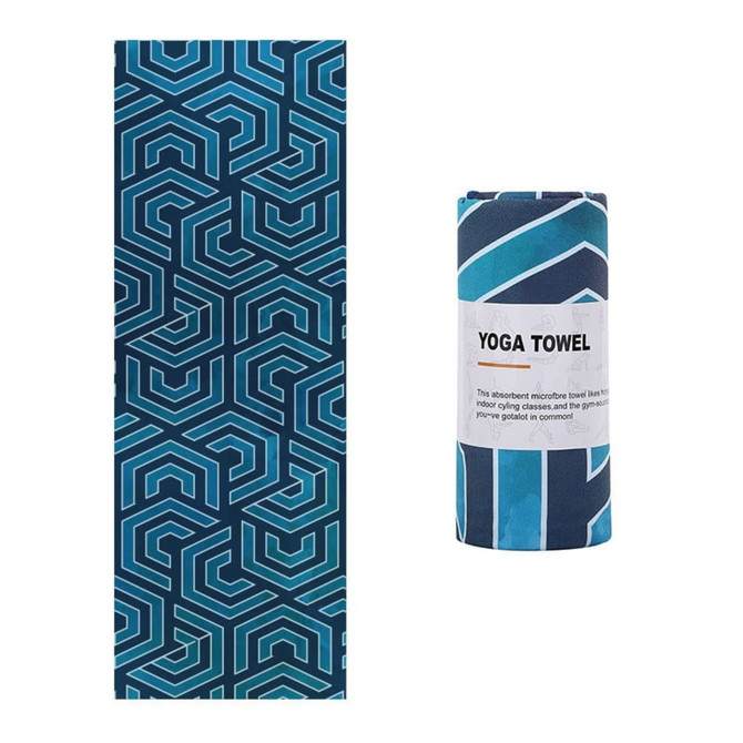 A blue and teal yoga towel with a geometric pattern, rolled and unrolled, featuring a logo and product label.