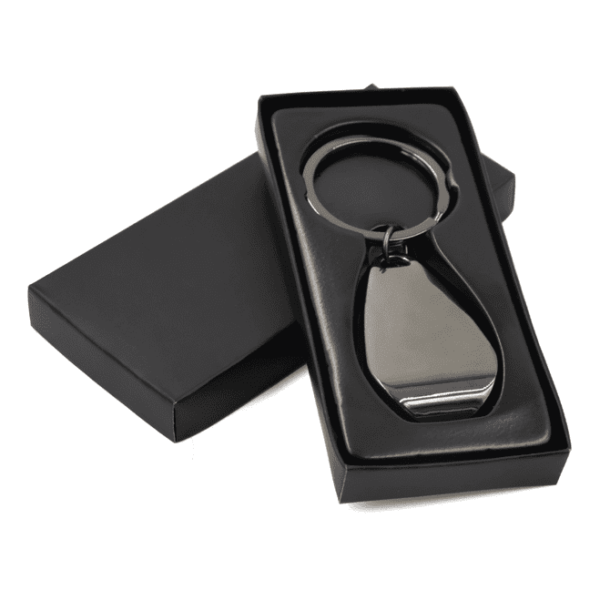 A gunmetal keychain with a bottle opener feature, presented in a black box.