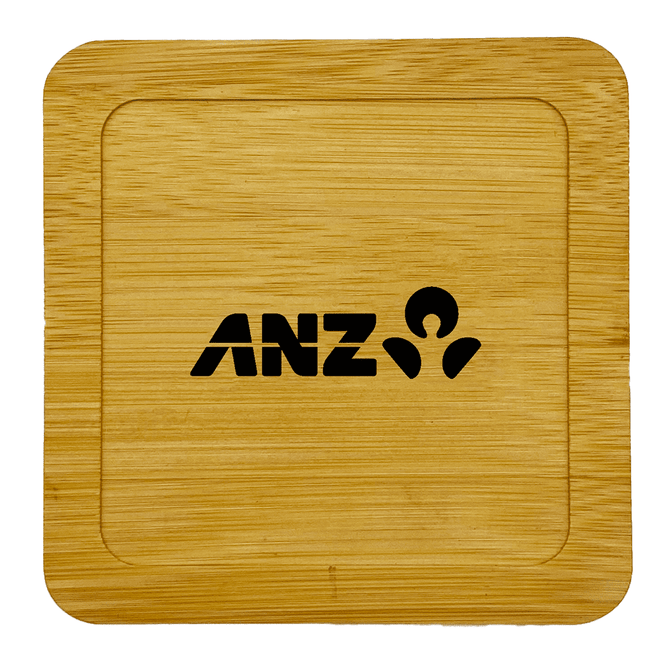 A bamboo coaster featuring a square design and a logo embossed in black.