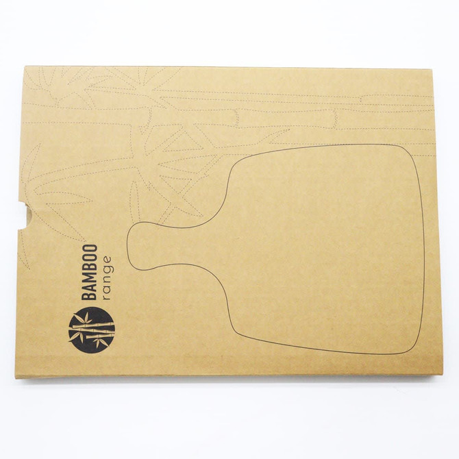 A bamboo cheese board and knife set in eco-friendly packaging, featuring a simple design and natural tones.