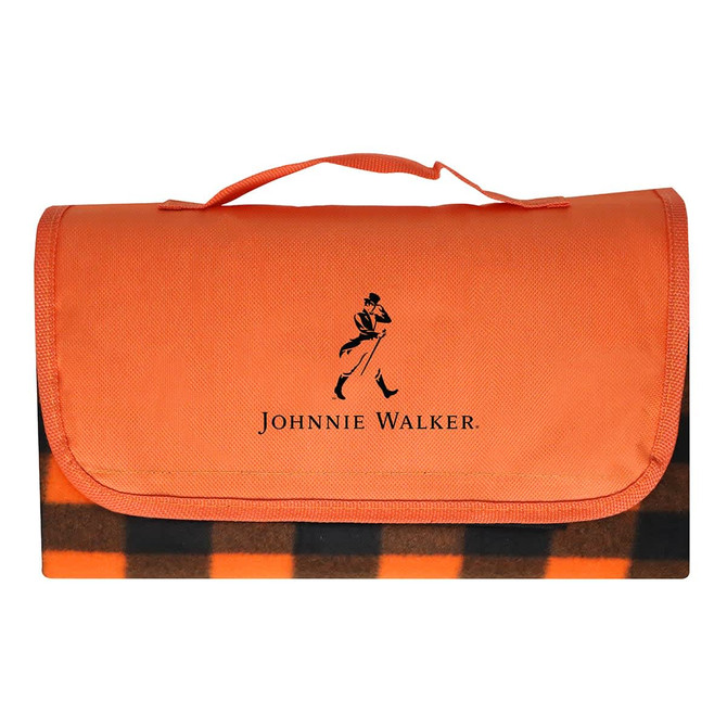 An orange picnic blanket with a checkered design and a logo on the front.