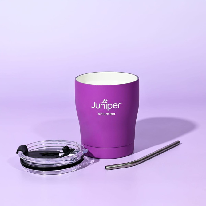 A drink bottle in purple with a clear lid, reusable straw, and a logo on the front.