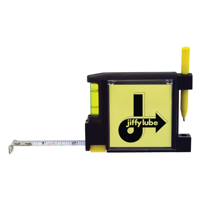 A black tape measure with a yellow notepad and pen attached, featuring a logo on the front.