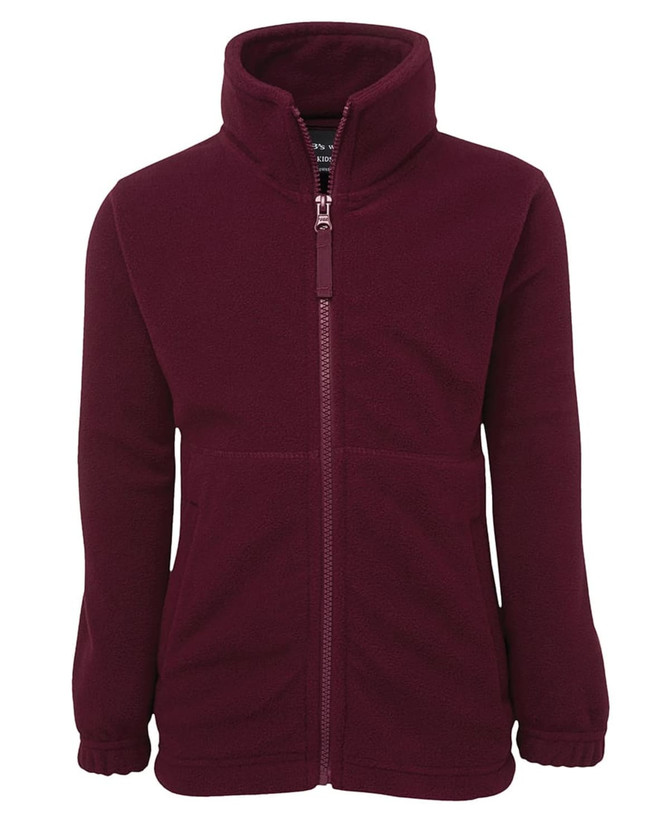 A maroon polar fleece jacket with a full zip, high collar, and front pockets, featuring a logo on the label.