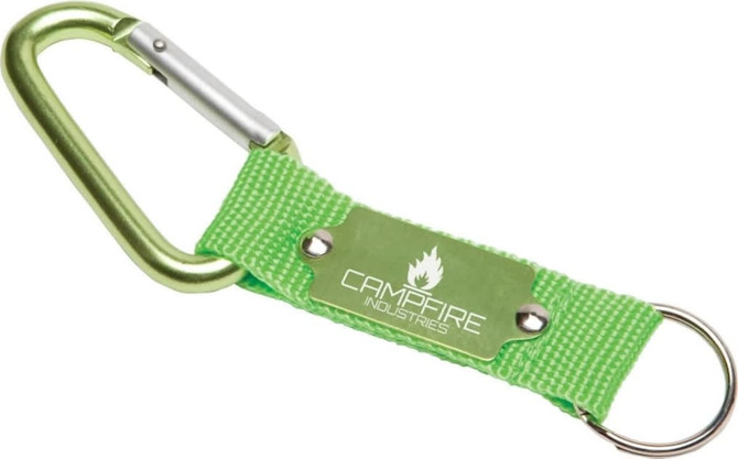 A green keyring with a silver carabiner and a branded metal plate.