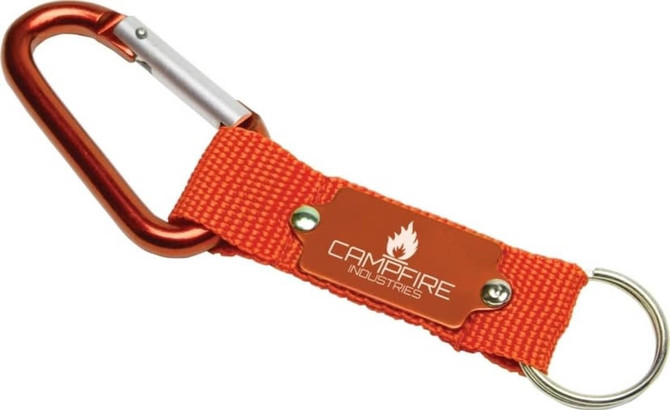 An orange keyring with a metal carabiner and a woven strap, featuring a branding plate.