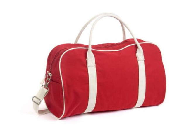A red contrast bag with white handles and trim, featuring a detachable shoulder strap.