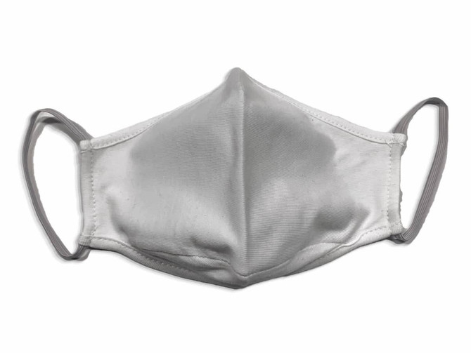 A grey face mask made from 100% cotton, featuring elastic ear loops and a smooth finish.