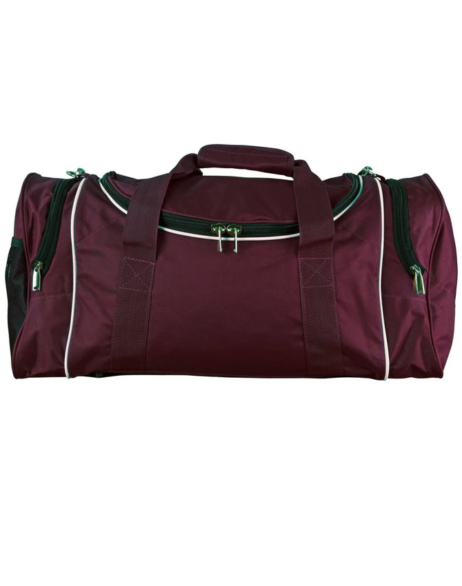 A maroon duffle bag with zippered compartments, featuring green accents and handles, and a logo on the side.