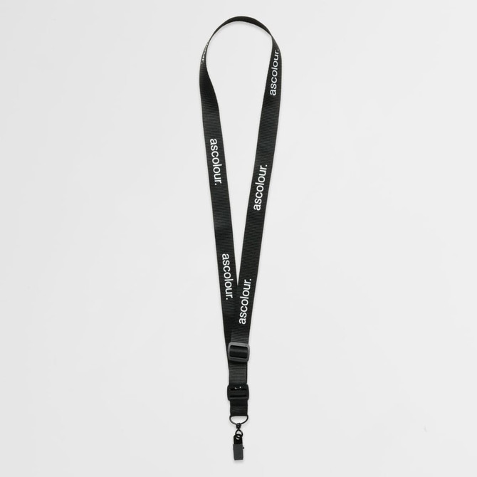 A black lanyard featuring a logo, designed for use at exhibitions and events.