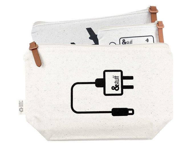 A cream-coloured travel set featuring two pouches with leather accents and minimalist designs, including a logo.