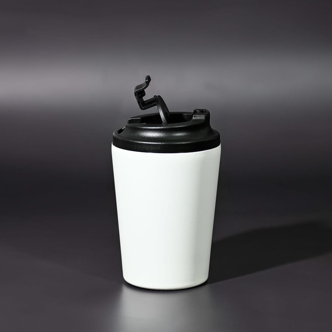 A travel mug with a black lid and a sleek white body, featuring a logo on the side.