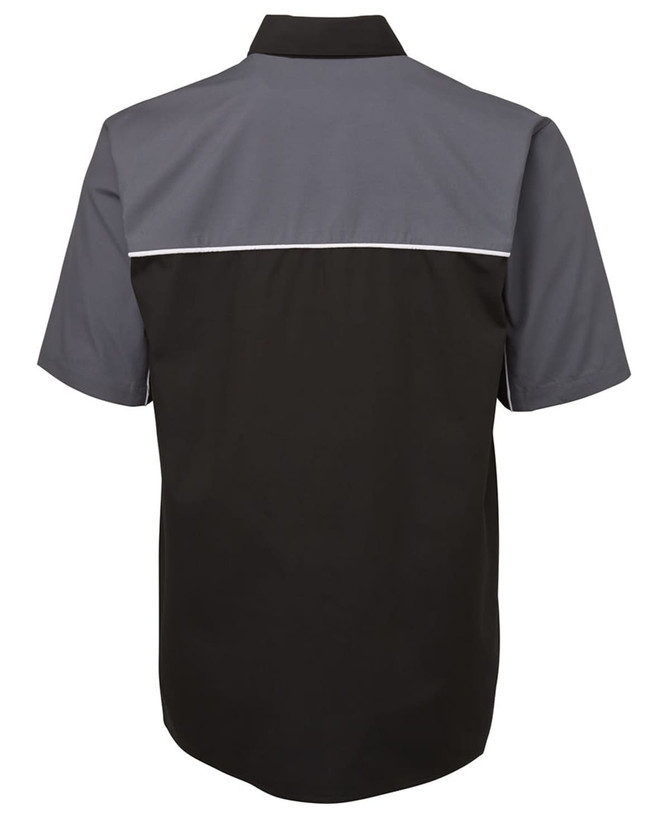 A black and grey button-up shirt with short sleeves and a contrasting yoke design, featuring a logo.