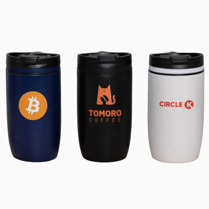 Three travel mugs in navy, black, and white featuring different logos and a black lid.