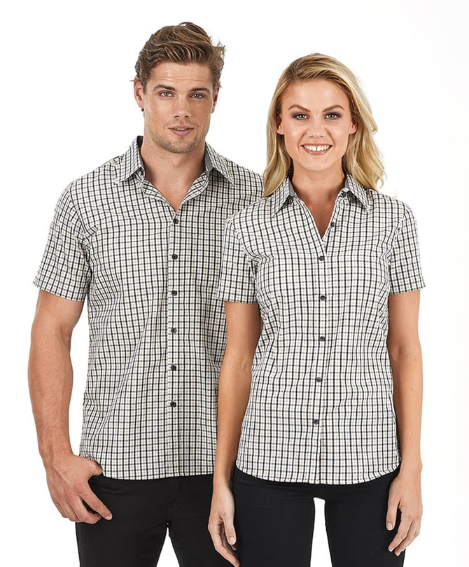 A short sleeve button-up shirt in a black and white checked pattern, featuring a logo.