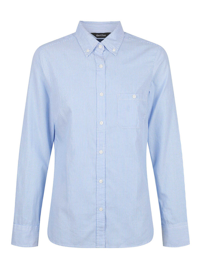 A light blue, long sleeve button-up shirt with a collar and a front pocket. Features a logo on the label.