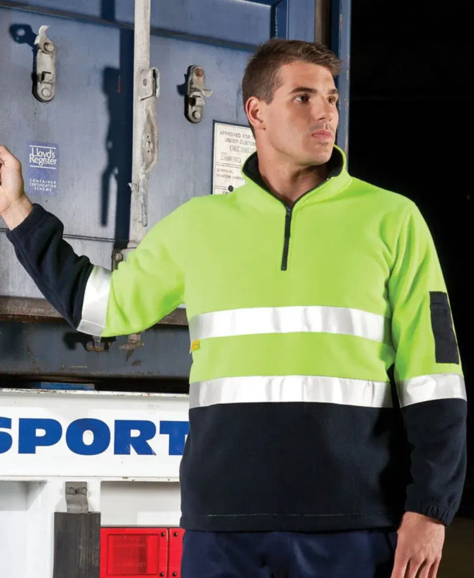 A high visibility polar fleece pullover in lime green and navy, featuring reflective stripes and a logo.
