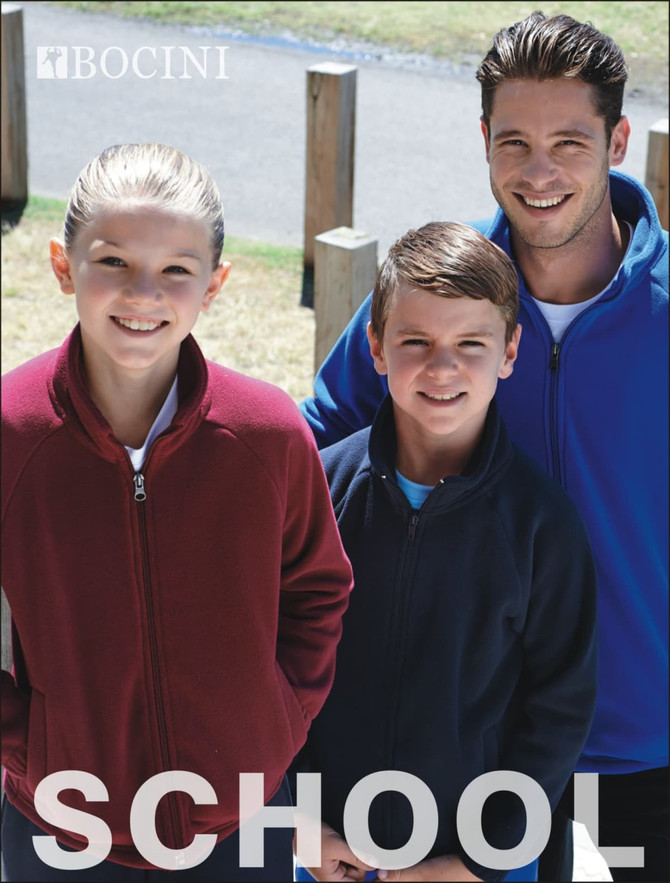 A red and navy polar fleece zip-through jacket worn by two children and an adult. The adult has a logo on their jacket.