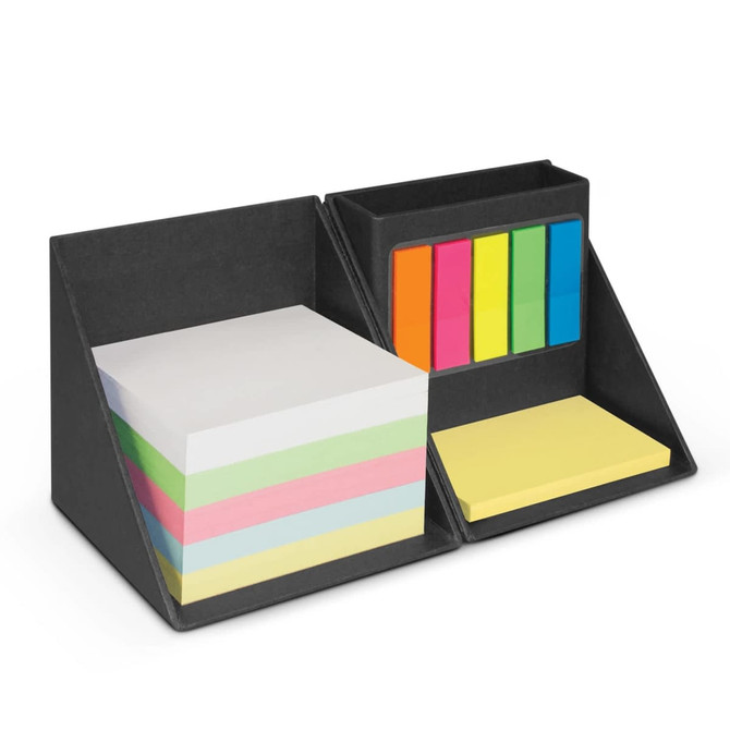 A desk organiser in black with sections for sticky notes and vibrant coloured index flags in pink, yellow, green, and blue.