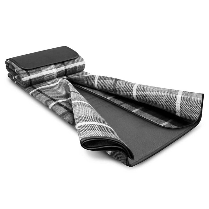 A black and grey checkered picnic blanket rolled partially open, featuring a solid black underside and a branding logo.