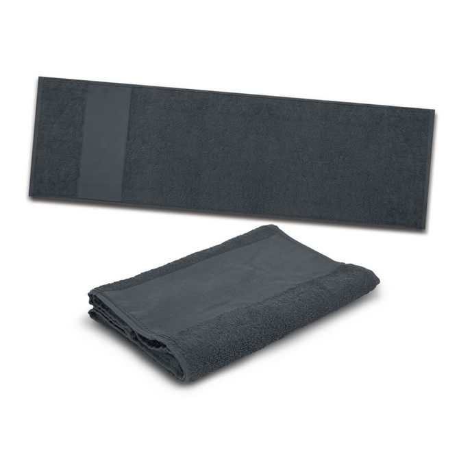 A folded and flat grey sports towel. The towel features a logo on one side.