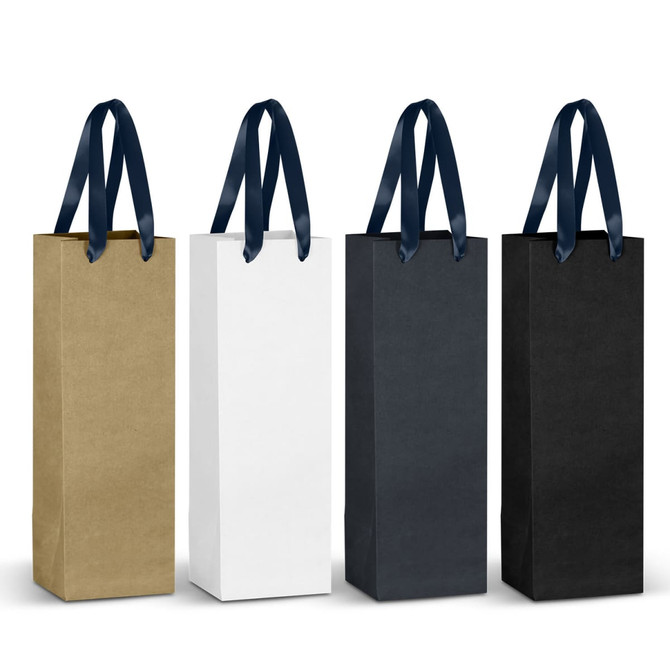 A collection of four champagne ribbon handle paper bags in gold, white, navy, and black, each with matching ribbon handles.