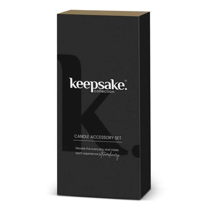 A black box containing a candle accessory set, featuring a minimalistic design and a logo.