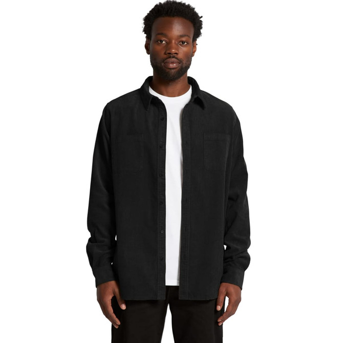A black button-up cord shirt with long sleeves, featuring a chest pocket, worn over a white t-shirt.