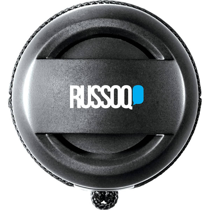 A round, black waterproof Bluetooth speaker featuring a textured surface and a hanging loop for portability.