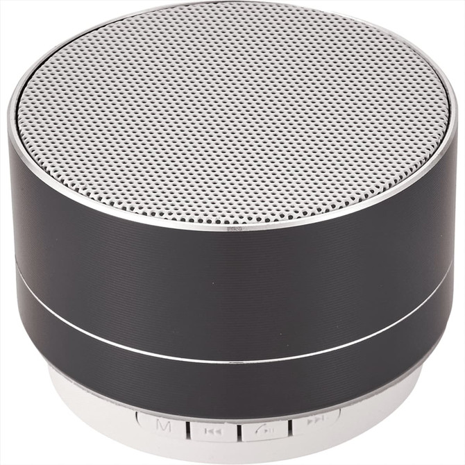 A round black aluminium Bluetooth speaker with a silver grille and control buttons on the base. It has a simple, modern design.