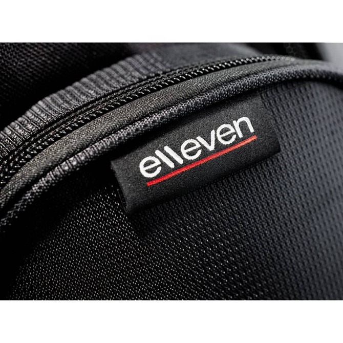 A black backpack features a sleek, textured design and a logo tag.