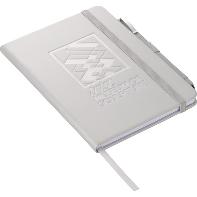 A grey hard-bound journal with an elastic band and a ribbon marker, featuring a logo on the cover.