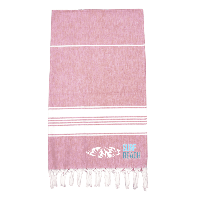 A pink 100% cotton Turkish towel featuring white stripes and fringe edges, with a logo design on one side.