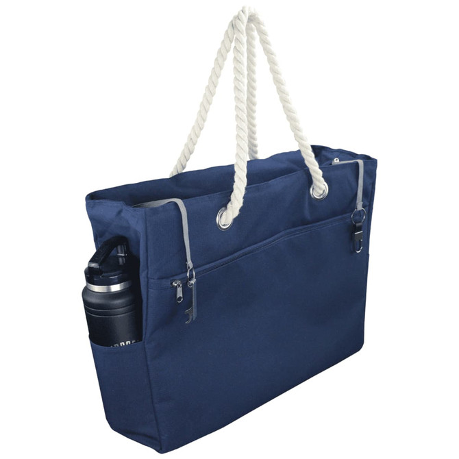 A navy waterproof beach bag with a rope handle and an external pocket for a drink bottle. It has a logo.