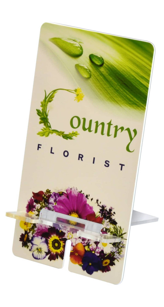 A phone stand featuring a floral design with green and colourful flowers, including a logo.