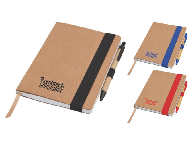 A set of three notepads with kraft covers, featuring black, blue, and red accents, each accompanied by a matching pen.
