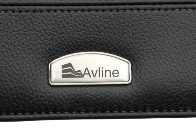 A black zip portfolio featuring a silver logo plate. The material has a textured finish.
