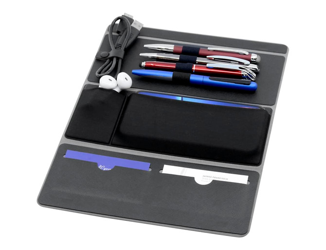 A black remote work A4 portfolio featuring pens, a USB cable, earphones, and pockets for notes and cards.