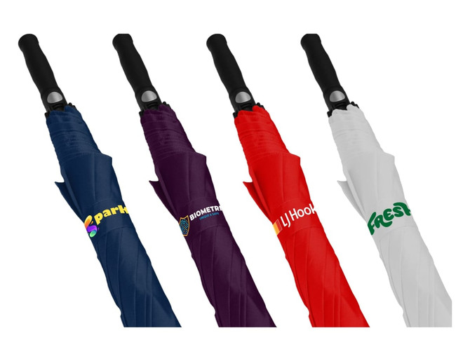 A set of four auto golf umbrellas in navy, purple, red, and white, each featuring a logo on the canopy.
