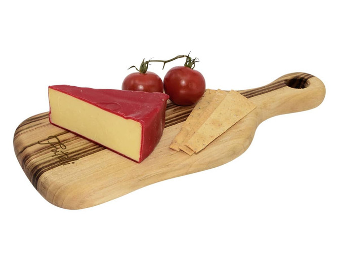 A wooden serving board in natural tones, featuring cheese, crackers, and cherry tomatoes. The board has a handle and a branding logo.