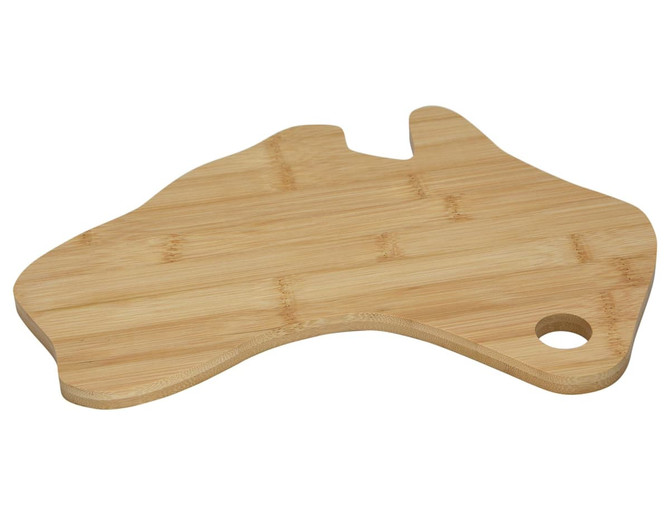 A bamboo cheese board shaped like Australia featuring a hole for hanging. It has a natural wood finish.