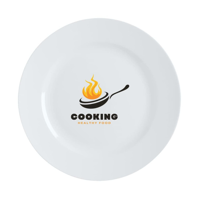 A white entrée plate with a rim featuring a cooking motif and the words "Cooking Healthy Food."