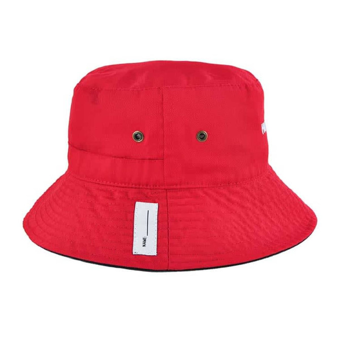A red reversible bucket hat with an adjustable toggle and a logo, featuring ventilation holes.