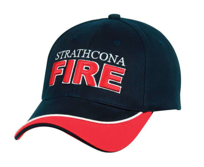 A navy cap with a red peak and white detailing, featuring a logo and text.