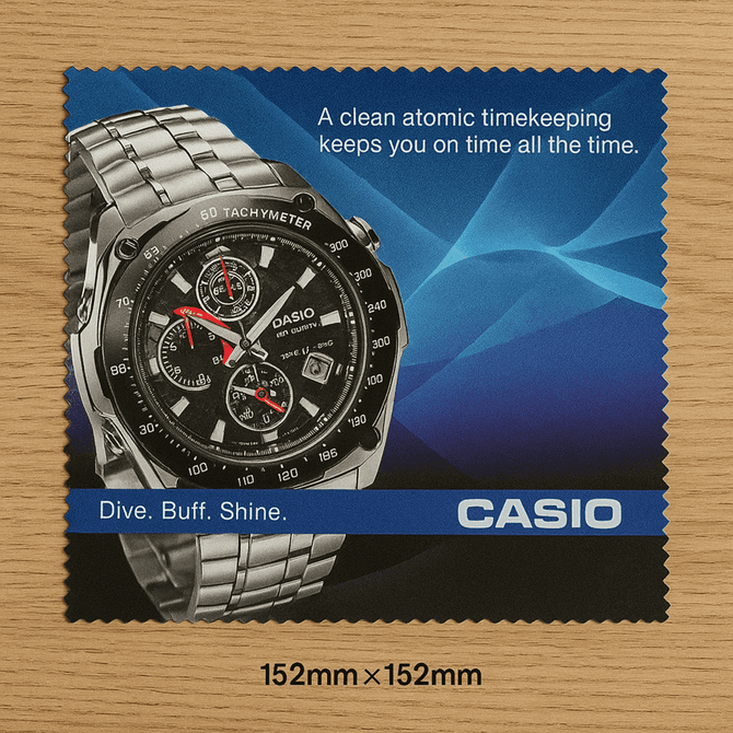 A black and silver cleaning cloth featuring a watch design and a logo, with a blue background.