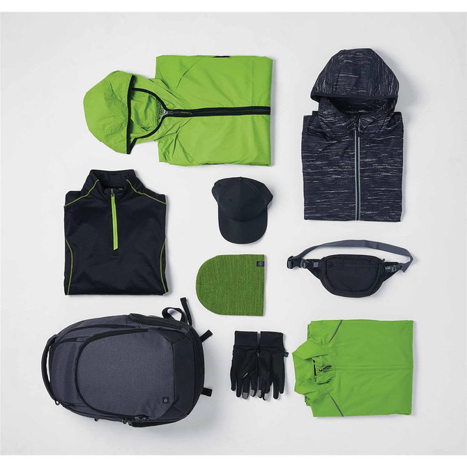 A grey backpack, black and green clothing items, a cap, a beanie, gloves, and a waist pack arranged neatly.
