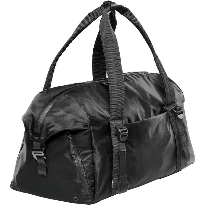 A black duffle bag with durable straps and zippered compartments, featuring a logo.