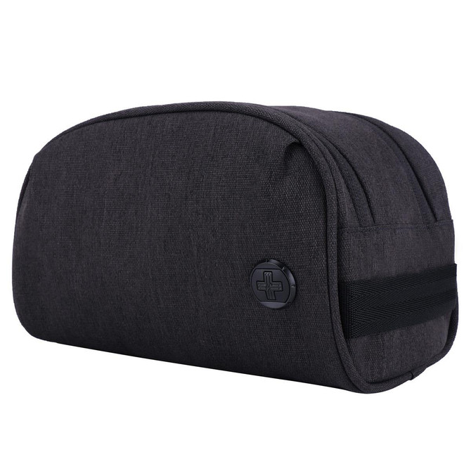 A dark grey toiletry bag with a logo, featuring a rounded shape and a black strap.
