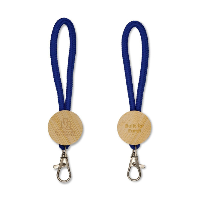 A blue keytag with a looped rope design and a wooden circular attachment featuring an engraved logo.