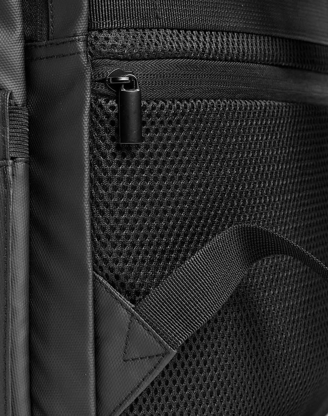 A black PU backpack featuring a textured mesh panel and a zippered pocket. It includes an adjustable strap and branding.